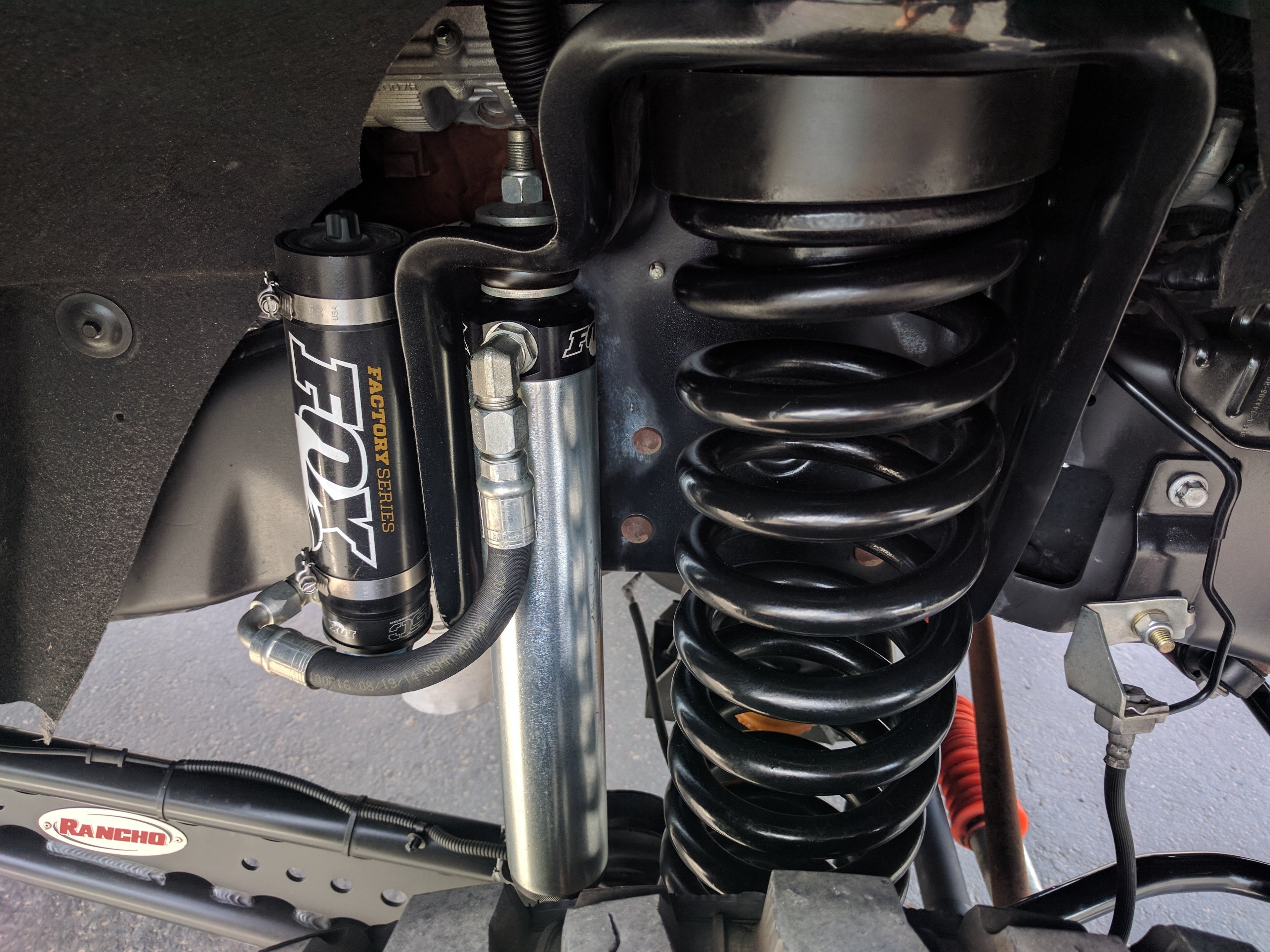 Fox 2.5 Factory Series Reservoir Shocks Front Pair for 2014-2023 Ram 2500 4WD